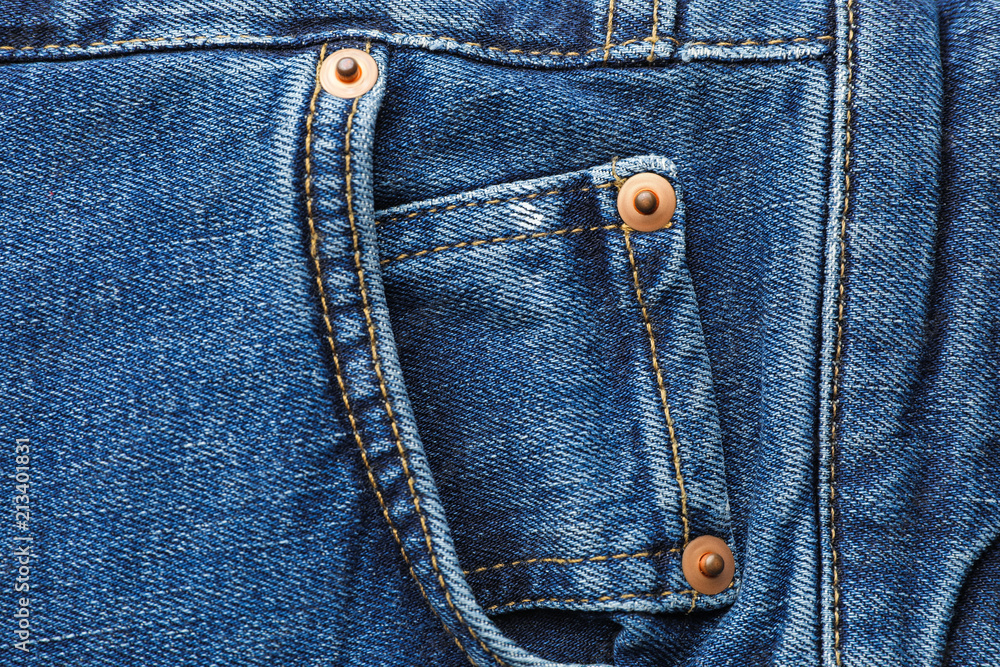Closeup view of jeans pocket as background Closeup view of jeans pocket as background