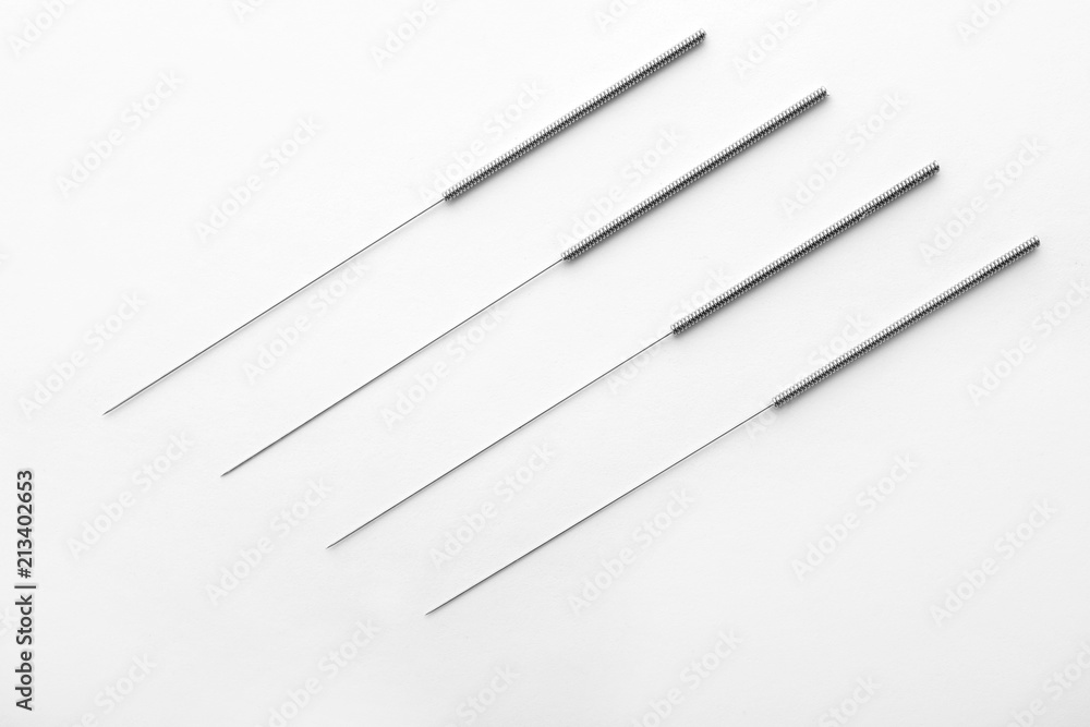 Needles for acupuncture on white background Needles for acupuncture on white background