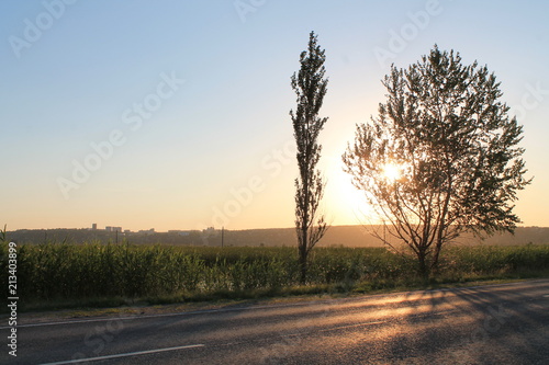 Russia nature landscape photography. Autumn sunset  outdoor nature of Russia. Fantastic sunset over lake near green meadow. Autumn nature sunset  Russia.