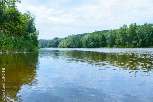 River and forest. Beautiful summer landscape. Camping.