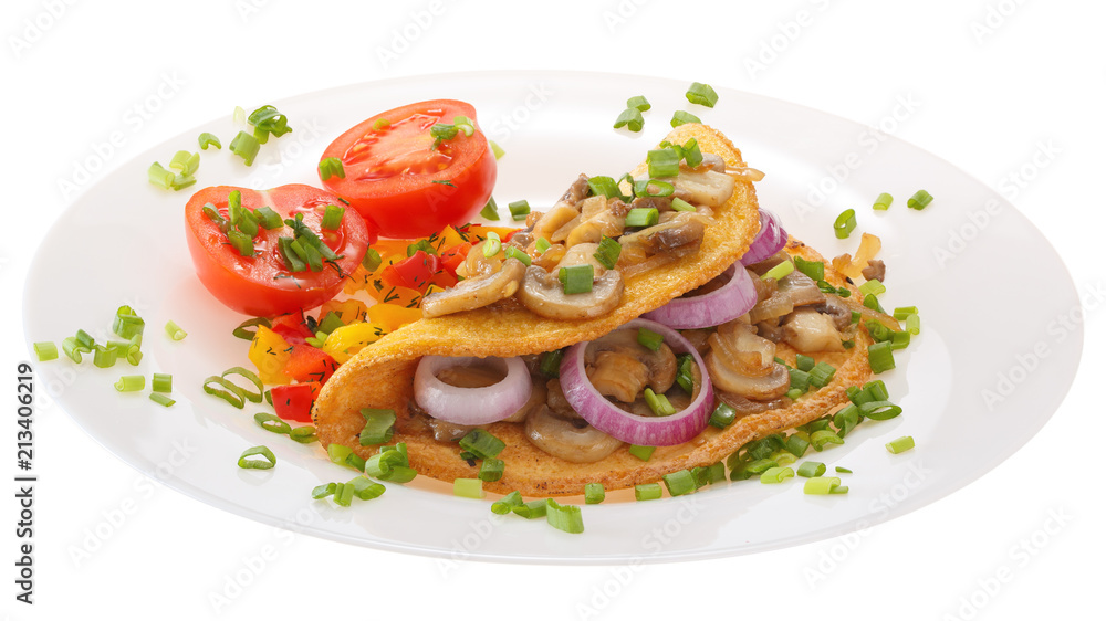 Omelet with mushrooms and tomatoes on a plate is decorated with onions. Isolated on white background. Omelet with mushrooms and tomatoes on a plate is decorated with onions. Isolated on white background.