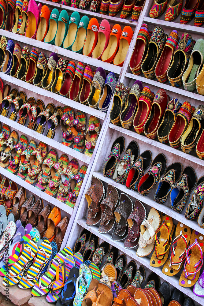 Fototapeta premium Display of shoes at the street market in Taj Ganj neighborhood of Agra, Uttar Pradesh, India