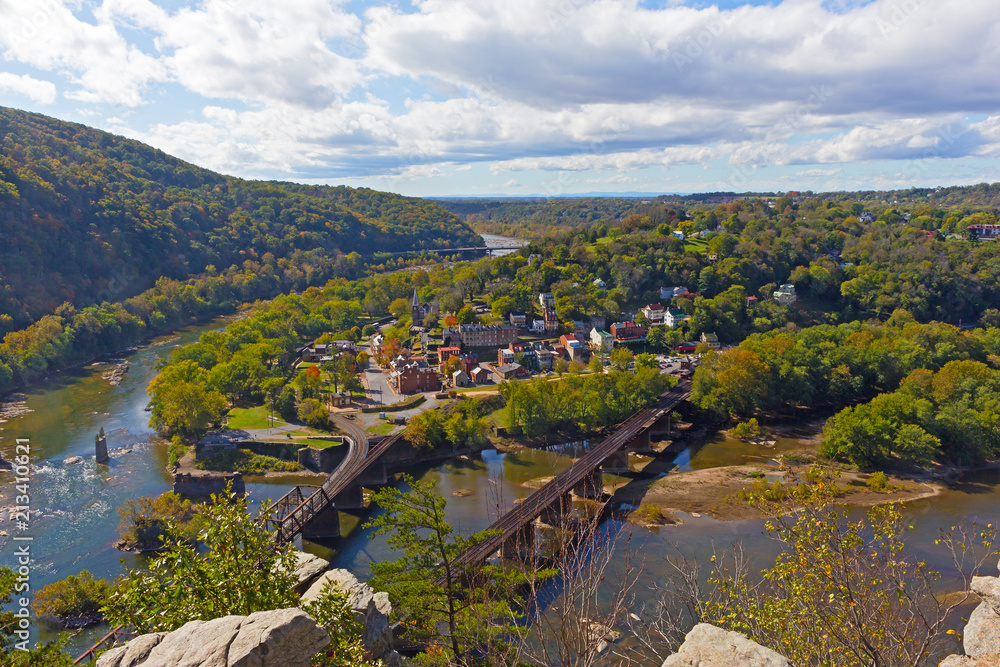 Potomac and Shenandoah rivers meet each other at Harpers Ferry historic town and park, West Virginia, USA. Autumn landscape with forests, mountains and rivers to the horizon.
