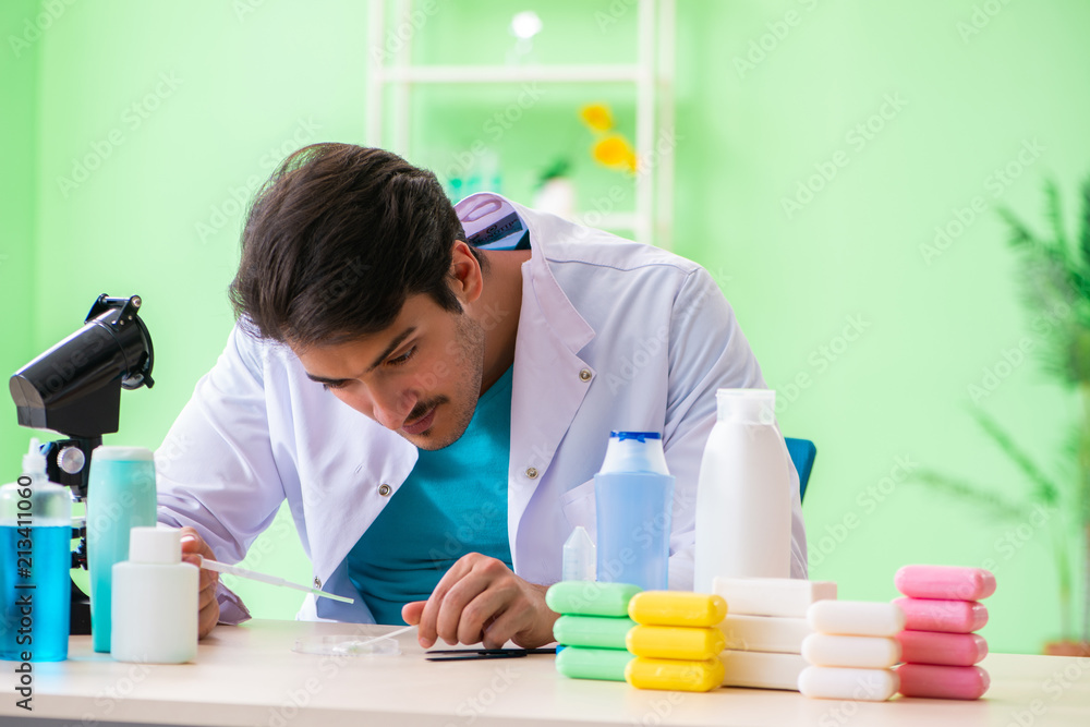 Chemist testing soap in the lab Chemist testing soap in the lab