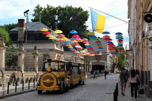 Colorful umbrellas in front of the entrance to the Potocki Palace, Lviv, Ukraine