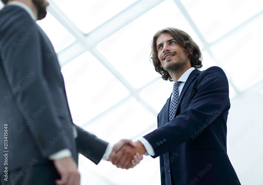 Close up image of business handshake at meeting. Close up image of business handshake at meeting.