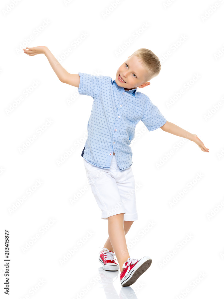 The little boy is emotionally waving his arms. The little boy is emotionally waving his arms.