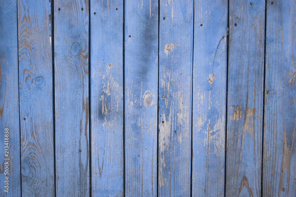 blue old wooden fence. wood palisade background. planks texture blue old wooden fence. wood palisade background. planks texture
