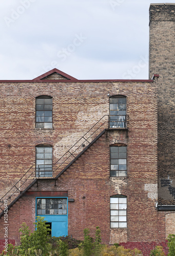 Old Brick Building with Smoke Stack