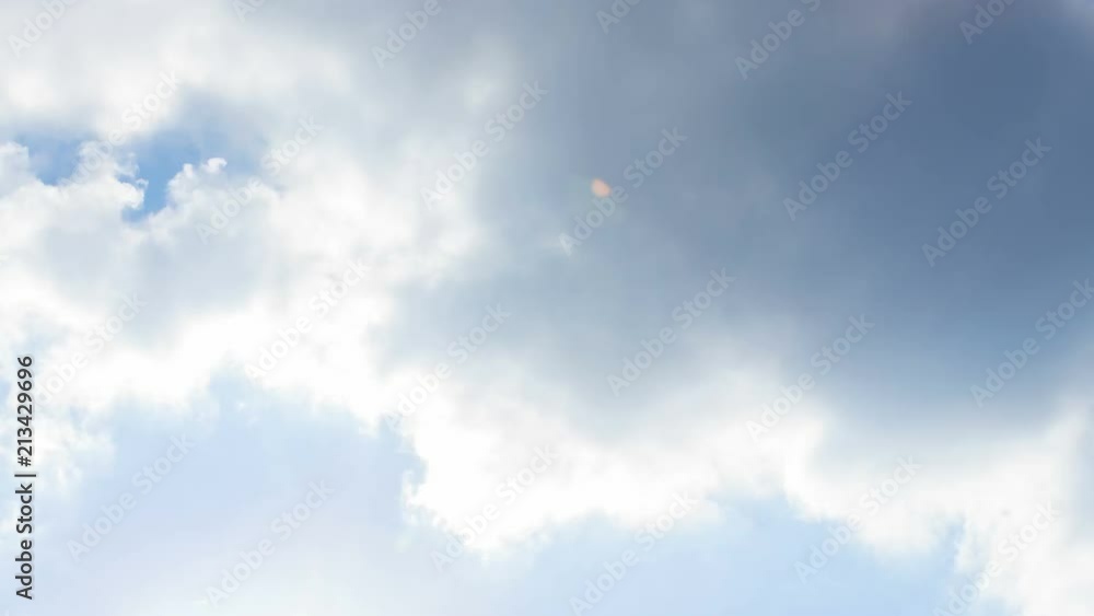 Timelapse of white summer clouds moving through very blue sky Timelapse of white summer clouds moving through very blue sky