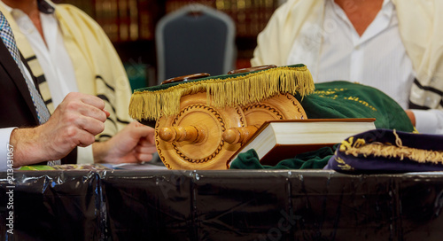 Jewish man dressed in ritual clothing family man mitzvah jerusalem Torah scrolls