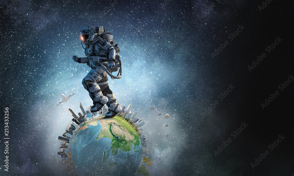 Fototapeta premium Spaceman running fast. Mixed media