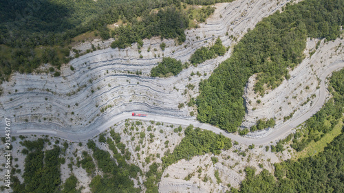 Scenic route to Mandrioli mountain pass. Vertical view of bends. View of walls made of sandstone and marl screeds named Scalacce photo