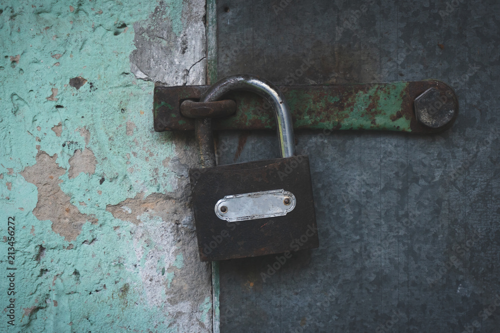 old padlock on the door old padlock on the door