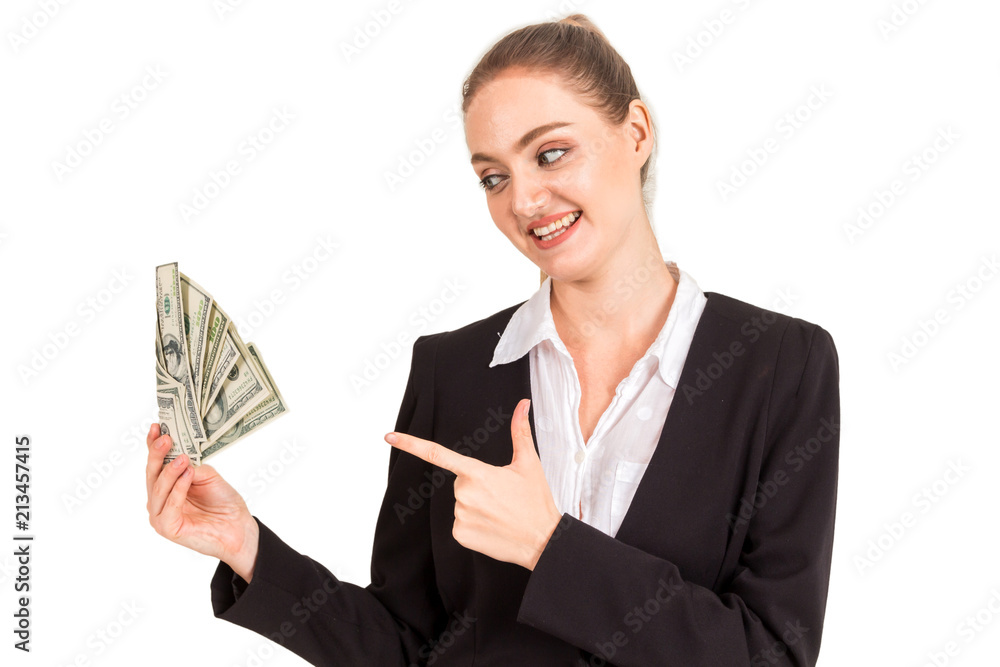 Beautiful and successful happy businesswoman in black suit holding money dollar notes isolated on white background Beautiful and successful happy businesswoman in black suit holding money dollar notes isolated on white background