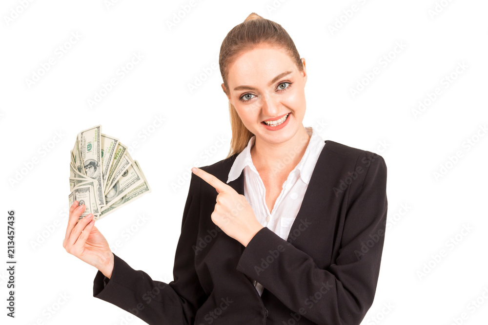Beautiful and successful happy businesswoman in black suit holding money dollar notes isolated on white background Beautiful and successful happy businesswoman in black suit holding money dollar notes isolated on white background