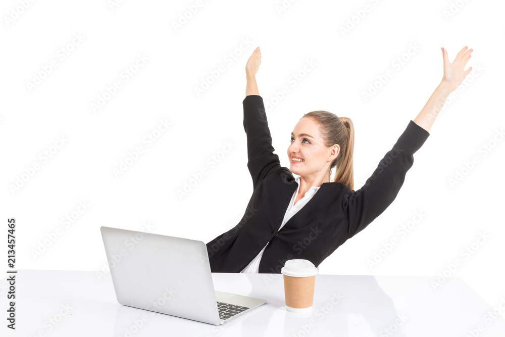 Successful businesswoman celebrating with arms up working project planning on the laptop computer isolated on white background Successful businesswoman celebrating with arms up working project planning on the laptop computer isolated on white background
