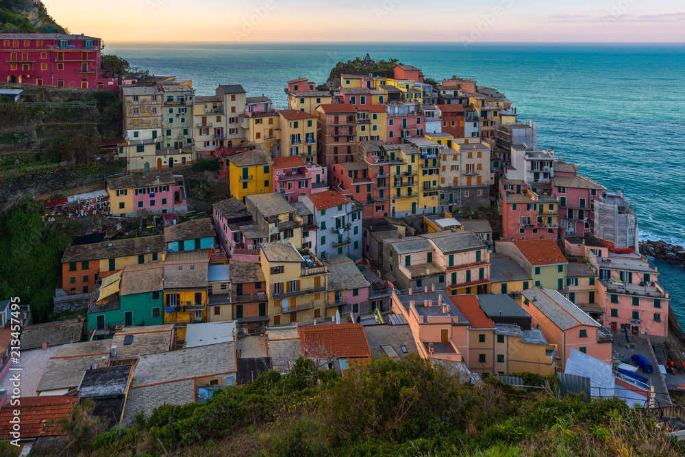 Manarola at sunrise, one of colorful villages of Cinque Terre, Italy