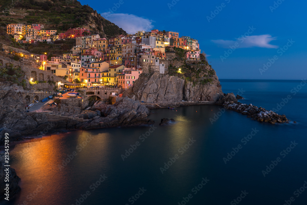 Manarola at night, one of colorful villages of Cinque Terre, Italy