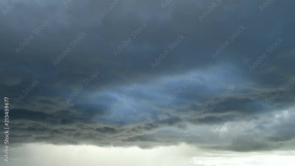 Light in the Dark and Dramatic Storm Clouds background, Black cumulus clouds before the beginning of a strong storm Light in the Dark and Dramatic Storm Clouds background, Black cumulus clouds before the beginning of a strong storm