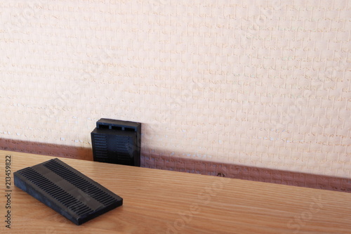 Picture of wedges for laying a parquet board.