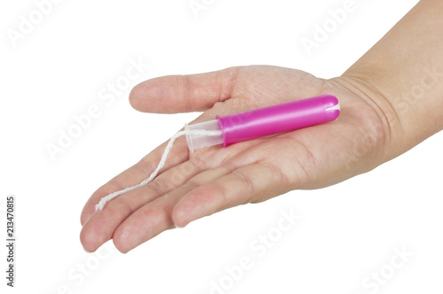 Obraz na plátně female hand holds a tampon with applicator isolated on white
