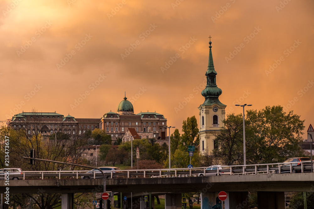 Curious sky after rain in Budapest. In the background to the right is the Church of St. Catherine of Alexandria, and the Buda Castle on the left.
