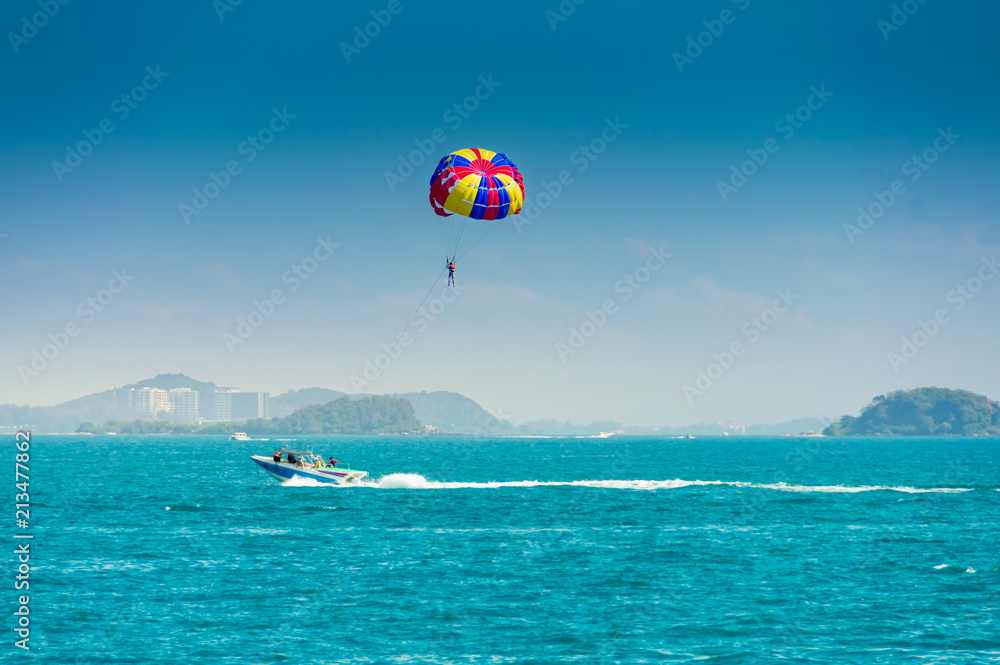 The sea and beautiful sky of Rayong Thailand is popular among people in play activity Parachute, Beautiful nature background The sea and beautiful sky of Rayong Thailand is popular among people in play activity Parachute, Beautiful nature background