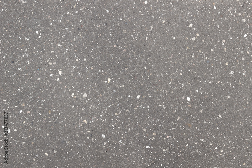 texture of gray asphalt with small stones, top view