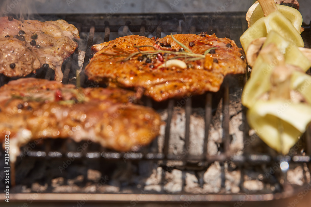 Slices of raw and grilled pork meat Slices of raw and grilled pork meat