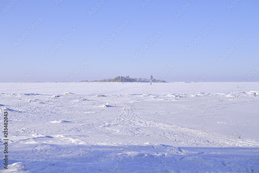 Bautiful view by the frozen and snow covered Baltic Sea.