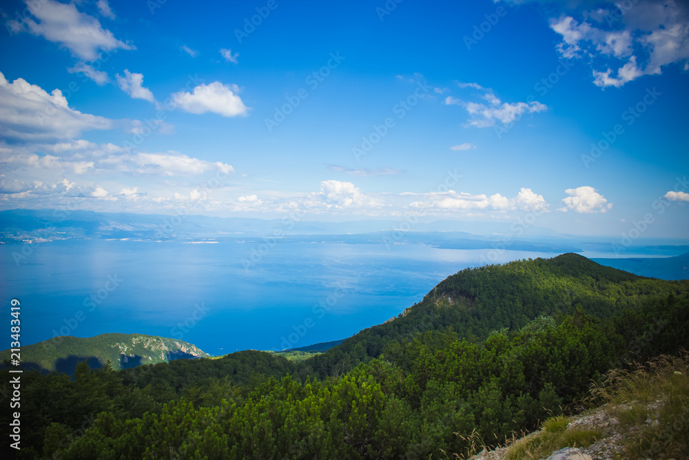 summer green nature forest mountain  sea landscape from above with beautiful view on paradise island