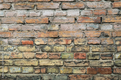Background of the old colorful bricks wall 