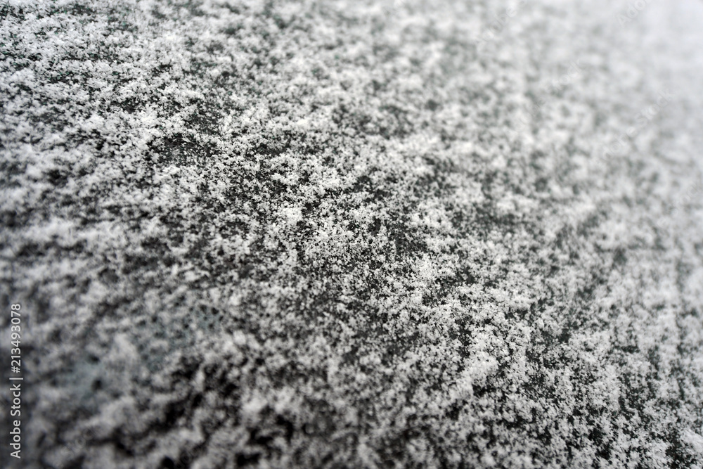 Car covered with frosty rime Car covered with frosty rime