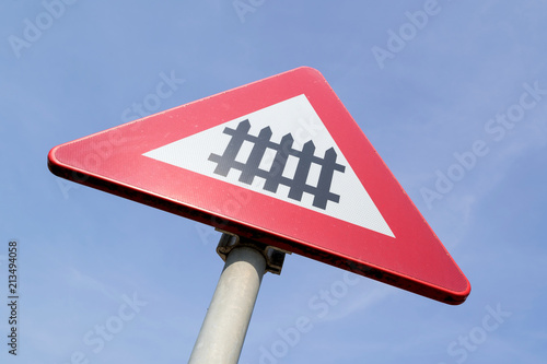 Fotografie Dutch road sign: level crossing with barrier or gates ahead