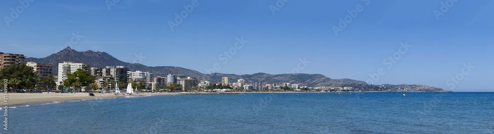panoramic view of heliopolis beach in the city of benicassim, spain