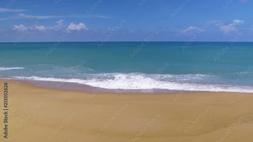 Beautiful blue ocean on sandy beach background with motion scene at Phuket, Thailand Beautiful blue ocean on sandy beach background with motion scene at Phuket, Thailand
