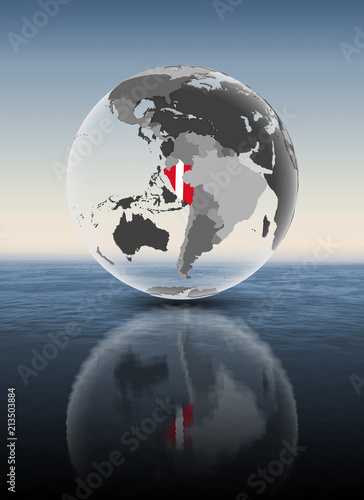 Fototapeta Naklejka Na Ścianę i Meble -  Peru on translucent globe above water