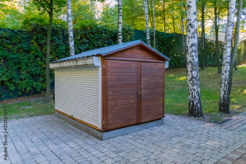a small utility room near the track in the park under the birches a small utility room near the track in the park under the birches