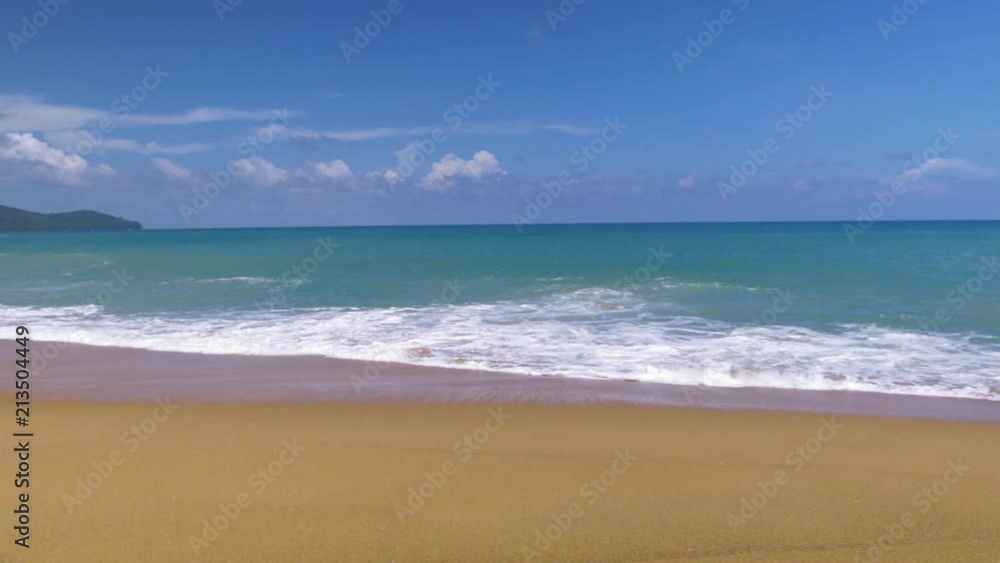 Beautiful blue ocean on sandy beach background with motion scene at Phuket, Thailand Beautiful blue ocean on sandy beach background with motion scene at Phuket, Thailand