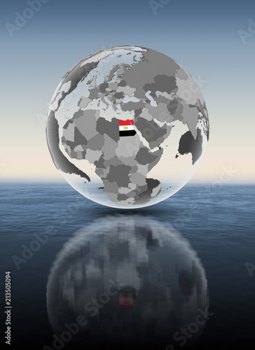 Fototapeta Naklejka Na Ścianę i Meble -  Egypt on translucent globe above water