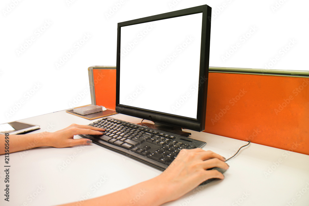 woman using computer at desk in office woman using computer at desk in office