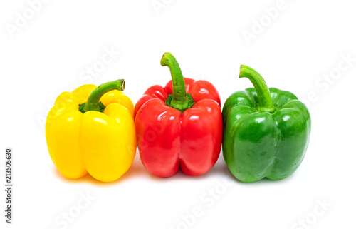 fresh colorful bell peppers isolated on white background