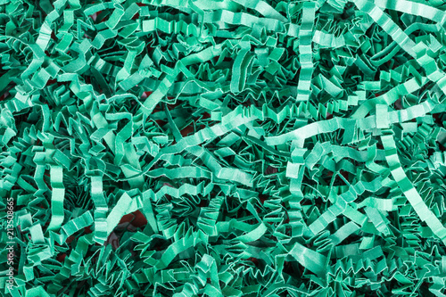 background of green shredded paper