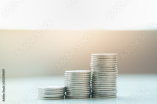 Close up of stack of silver coins. Business, Money, Finance and saving concept.