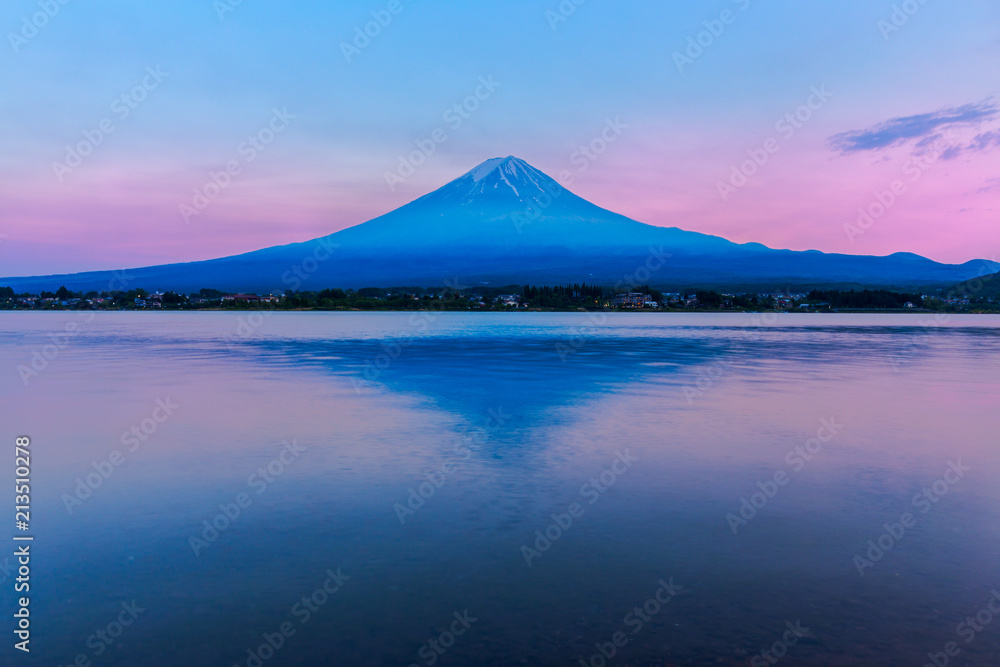 View of Mount Fuji and reflection by Lake kawaguchiko during sunset in Yamanashi, Japan.