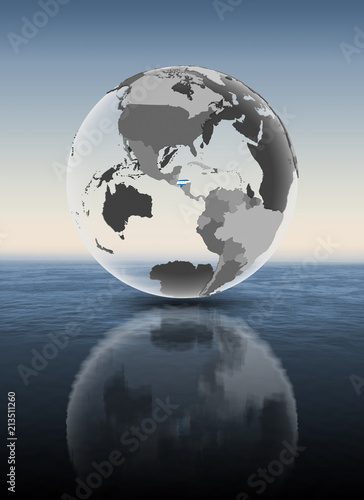 Honduras on translucent globe above water