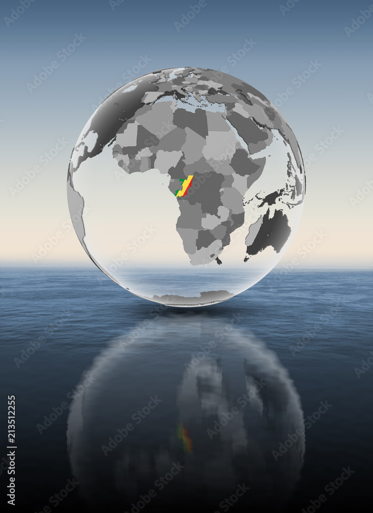 Congo on translucent globe above water Congo on translucent globe above water
