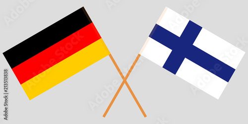 The crossed Germany and Finland flags. Vector