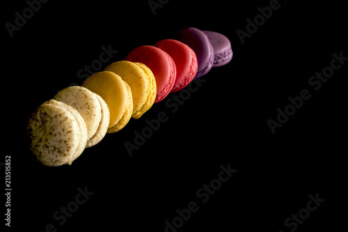 Some macaroons on black.